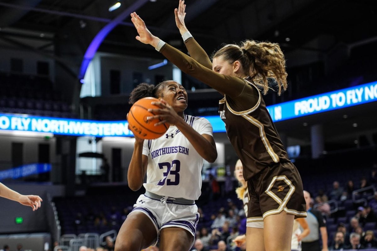 Graduate student forward Taylor Williams bangs in the post Sunday. Williams led NU with 22 points.