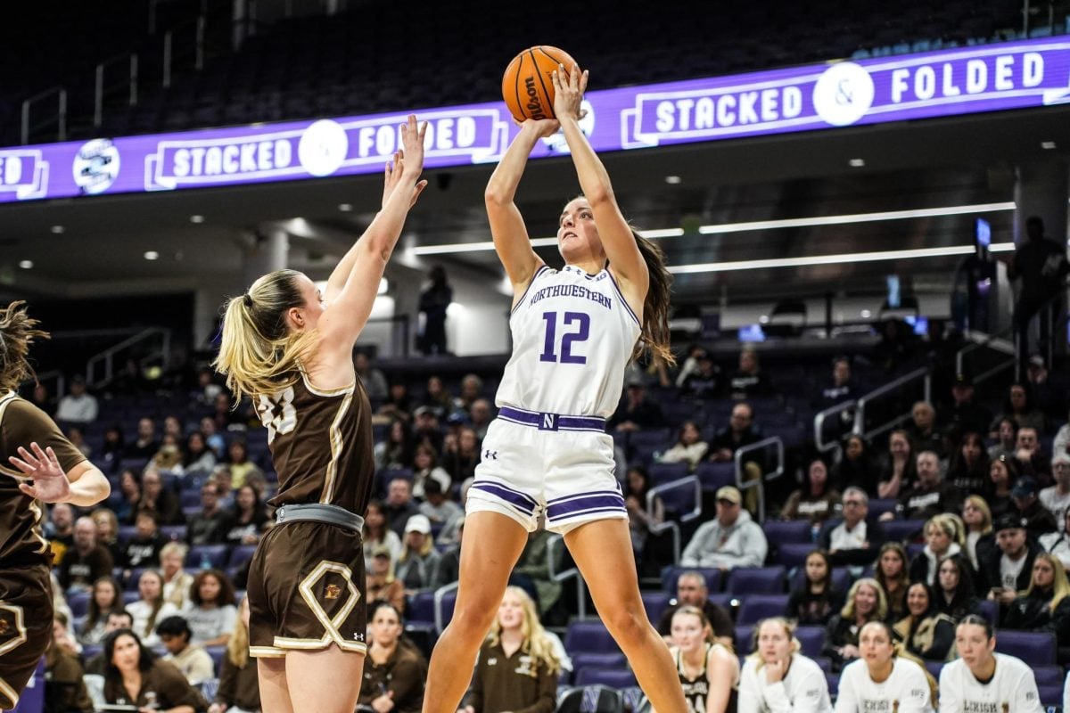 Sophomore guard Casey Harter attempts a three-point shot against Lehigh on Sunday. 