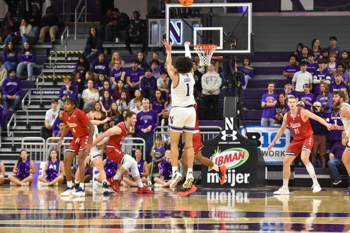 Jalen Leach lines up a three-pointer.