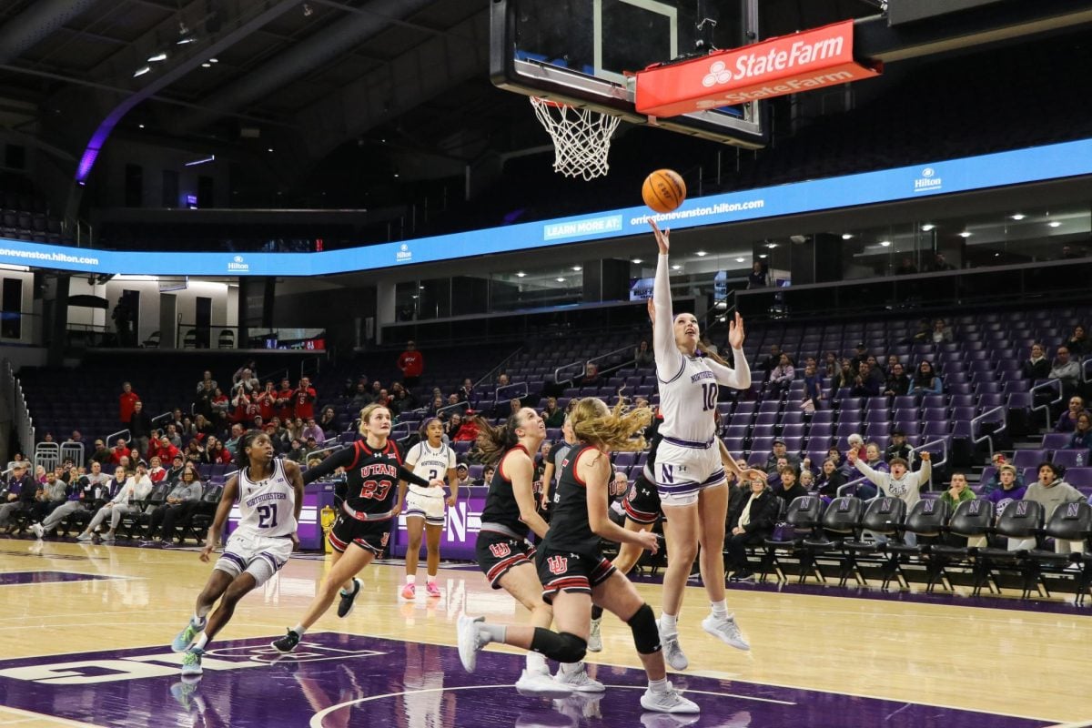 Senior forward Caileigh Walsh shoots the game-winning layup against Utah Thursday. 