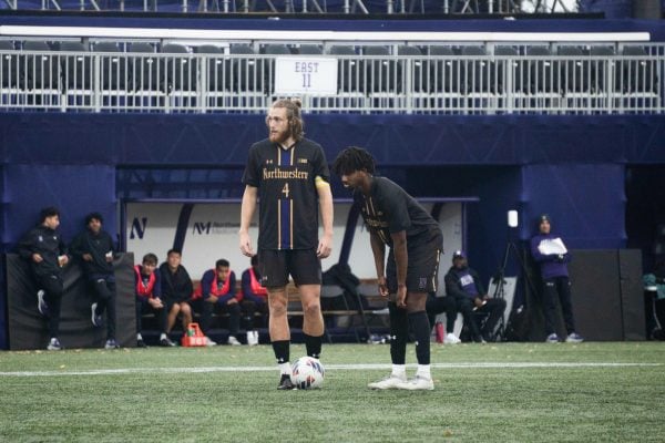 Senior midfielder Collin McCamy lines up for a free kick against Penn State on Sunday.