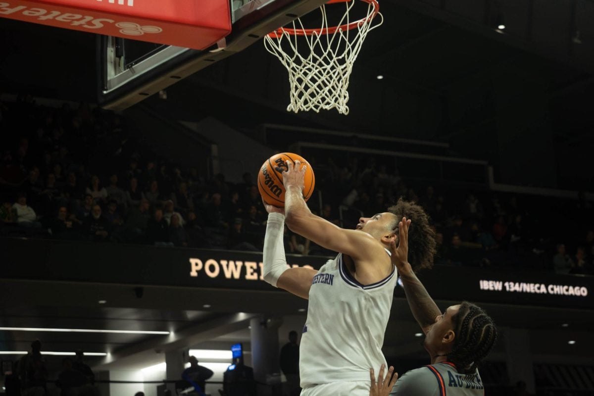 Jalen Leach pours in a layup against Pepperdine Friday. 