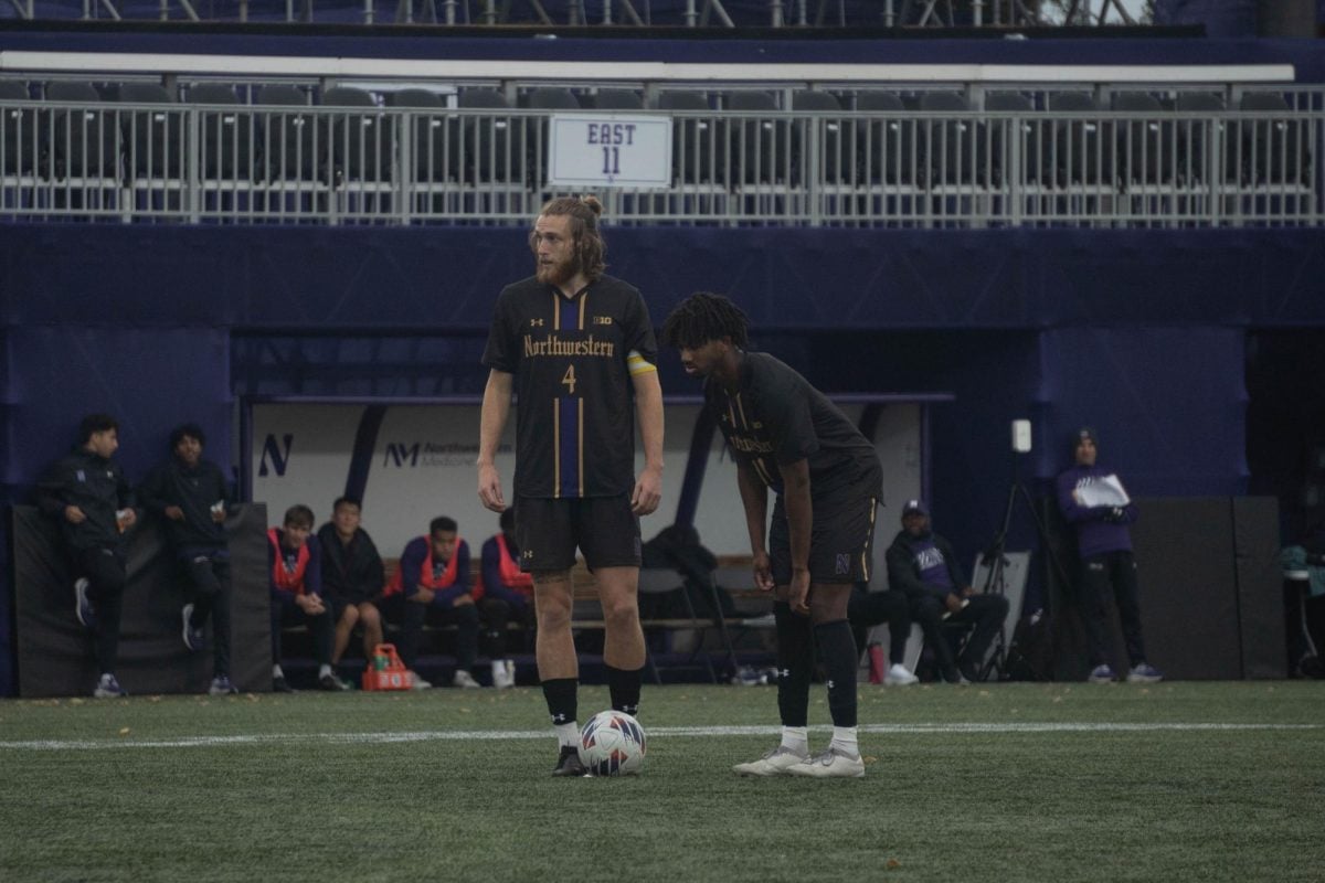 Senior midfielder Collin McCamy lines up for a free kick against Penn State on Sunday.