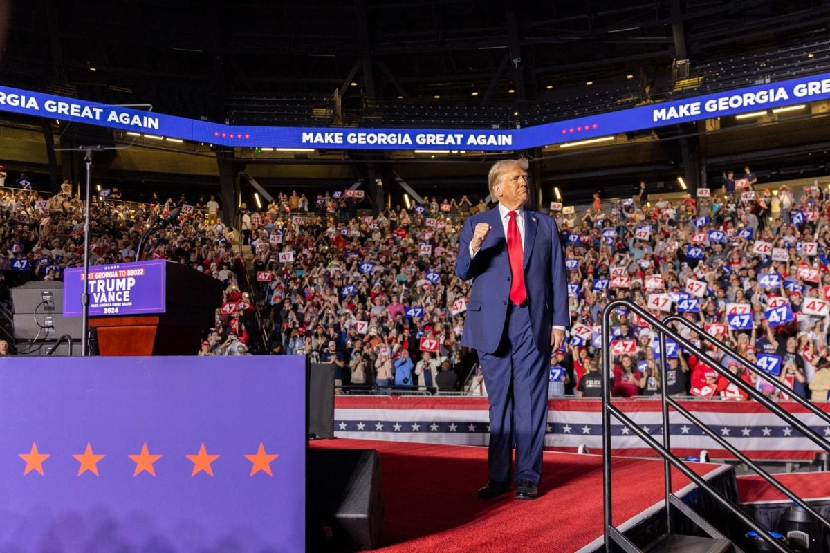 Republican presidential candidate former President Donald Trump takes the stage at a campaign rally at McCamish Pavilion at Georgia Tech in Atlanta on Oct. 28, 2024.