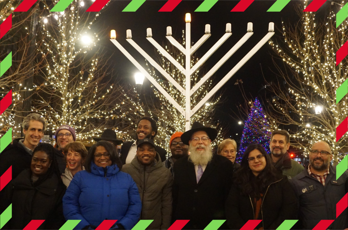 Evanston City Councilmembers join Mayor Daniel Biss, City Clerk Stephanie Mendoza and community leaders at the menorah lightning in Fountain Square.