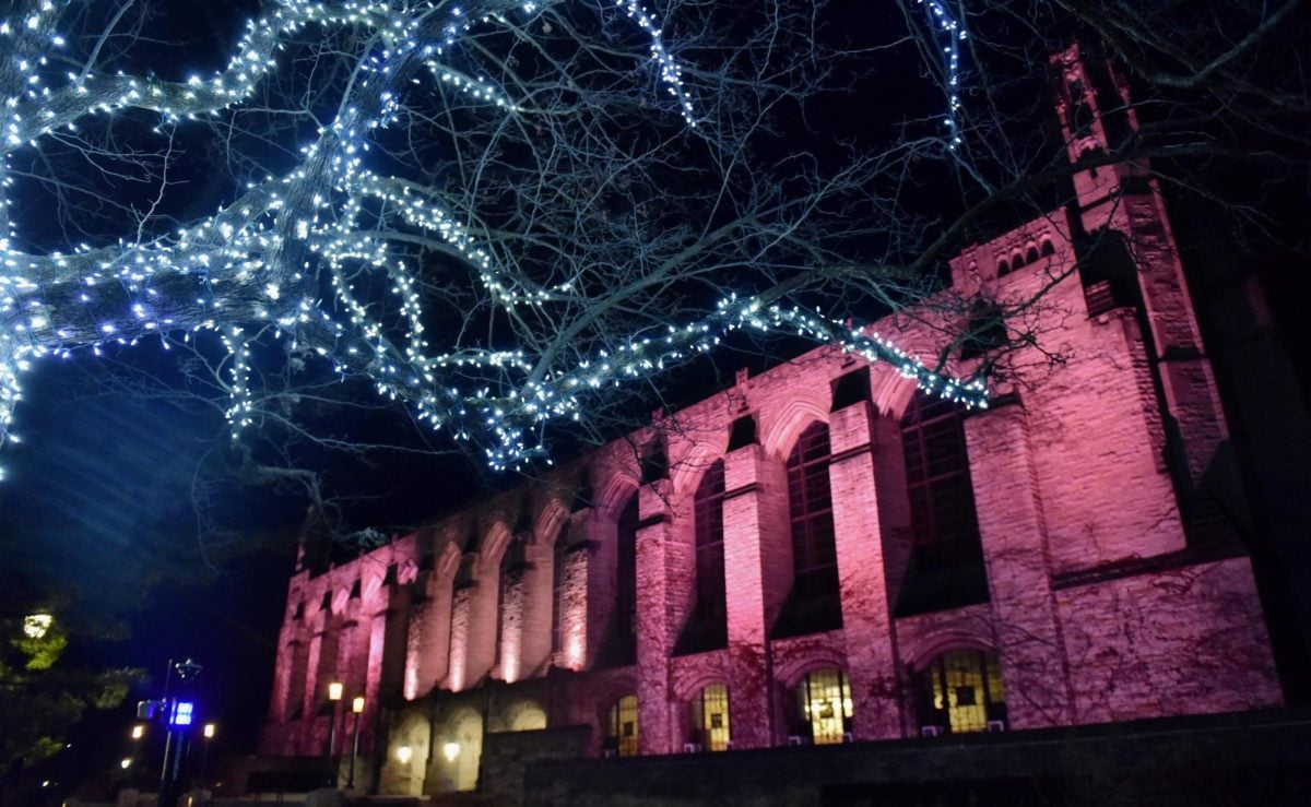 NU’s Deering Library, despite being closed for renovation, is complemented by tree branches decorated with lights. 