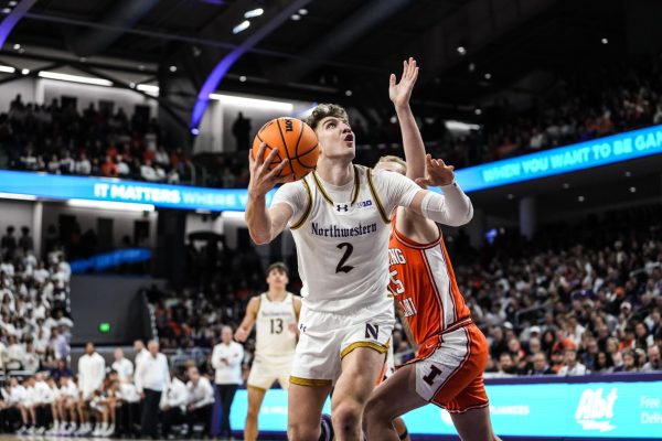 Junior forward Nick Martinelli looks to attempt a post shot against No. 19 Illinois Friday night.