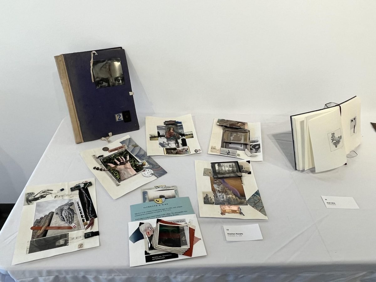 2 artist’s books layout on a white table.