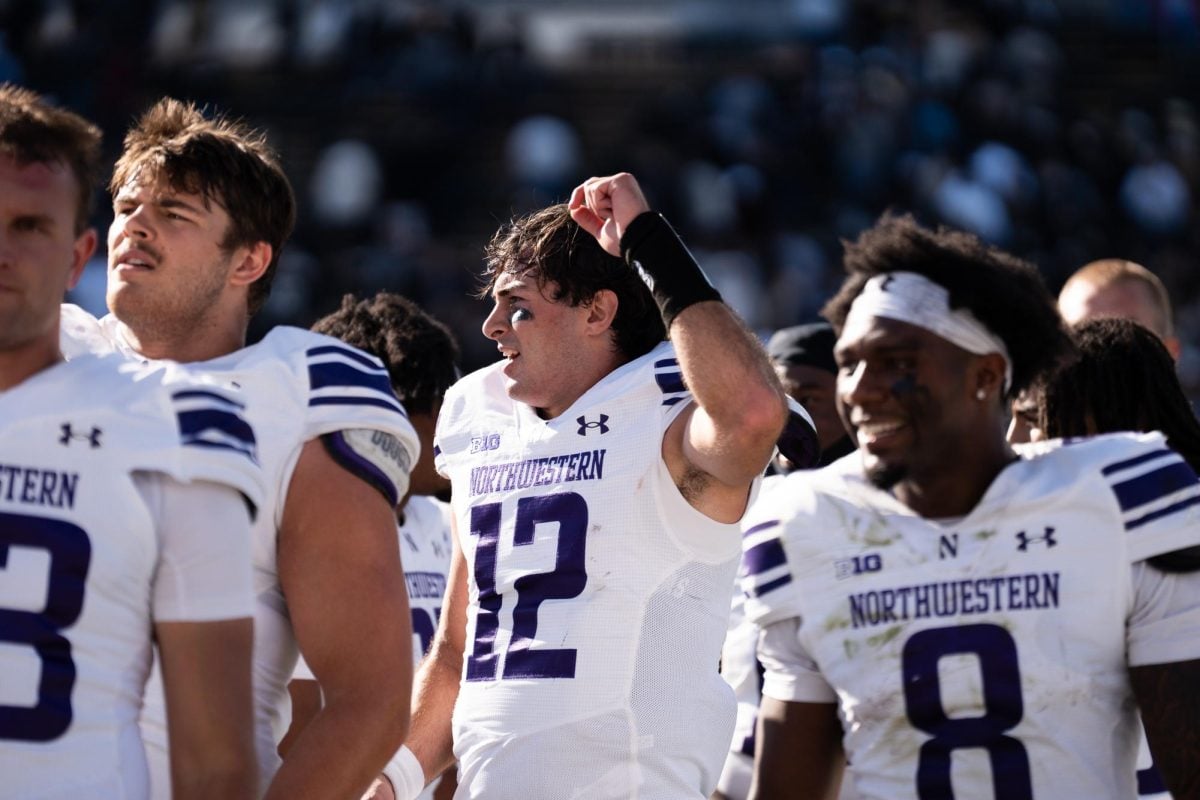 Northwestern quarterback Jack Lausch celebrates after beating Purdue in overtime last fall. Lausch will join Northwestern baseball as an outfielder for the 2025 season. 