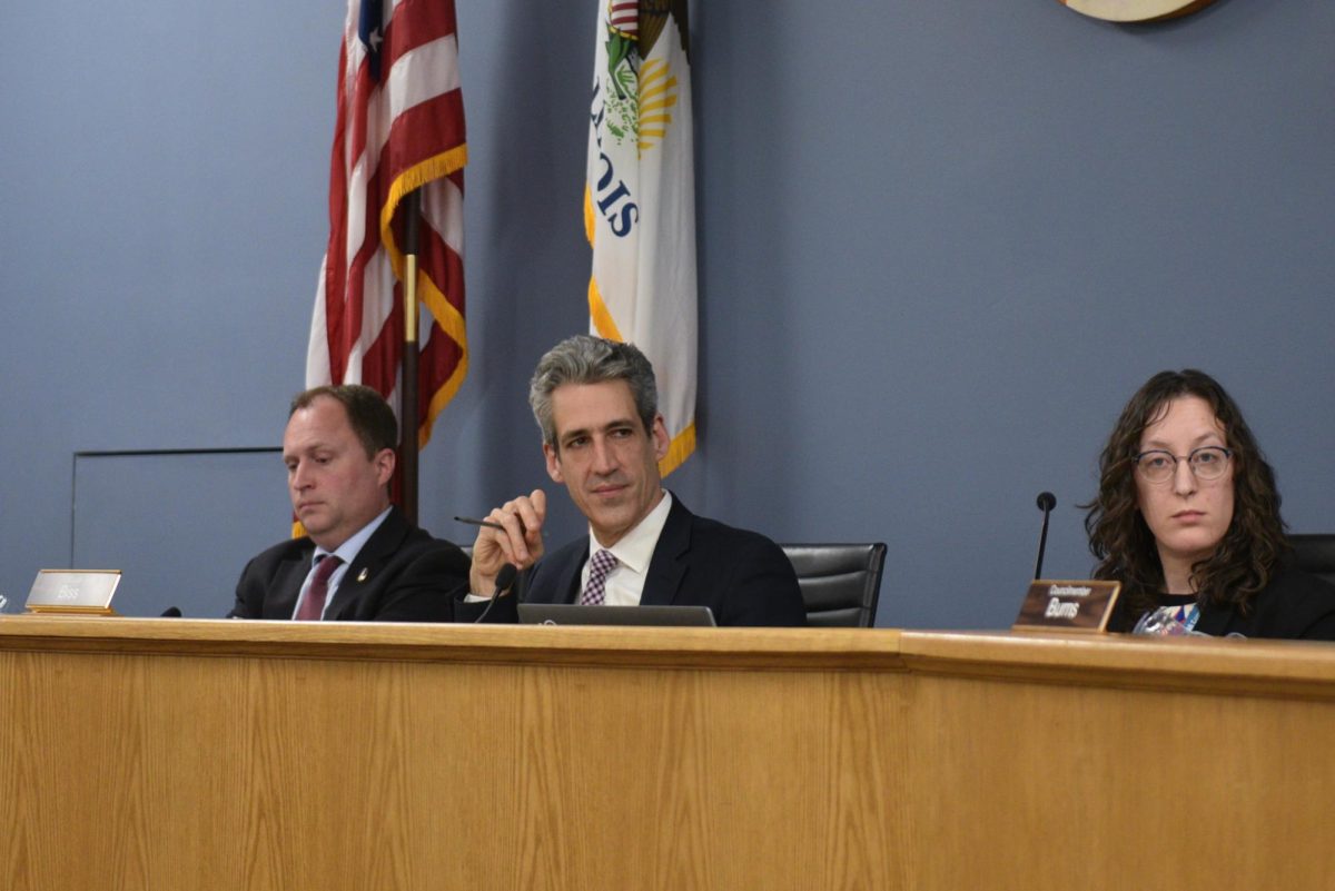 Mayor Daniel Biss hears discussion related to Envision Evanston consultants at a City Council meeting Monday. 