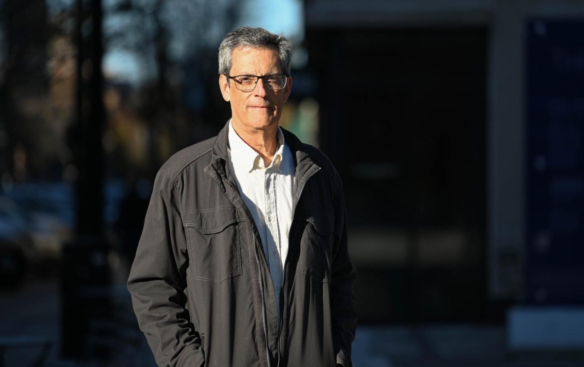 Mayoral candidate Jeff Boarini poses for a portrait at Fountain Square in downtown Evanston in November 2024.