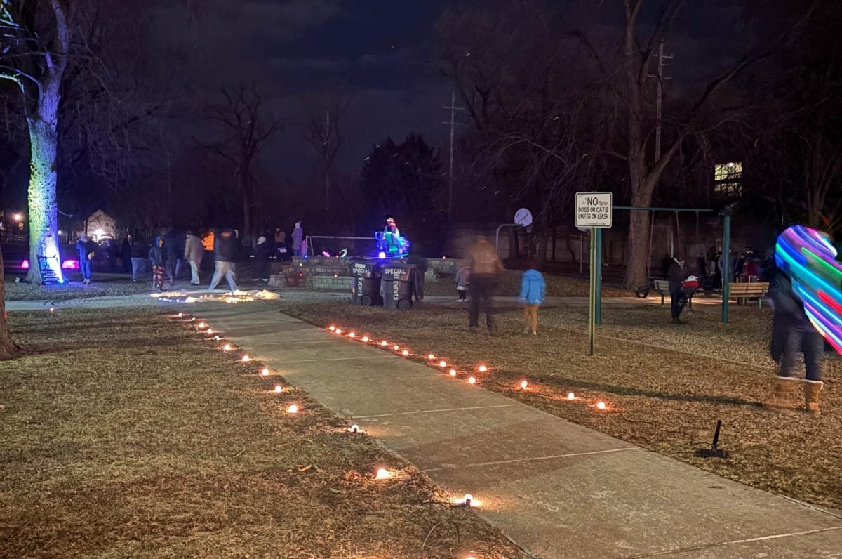 Attendees sipped on free hot cocoa and walked the lit up pathways as the “L” train rumbled by in the background. Children spun around with multicolor light up hula hoops. 