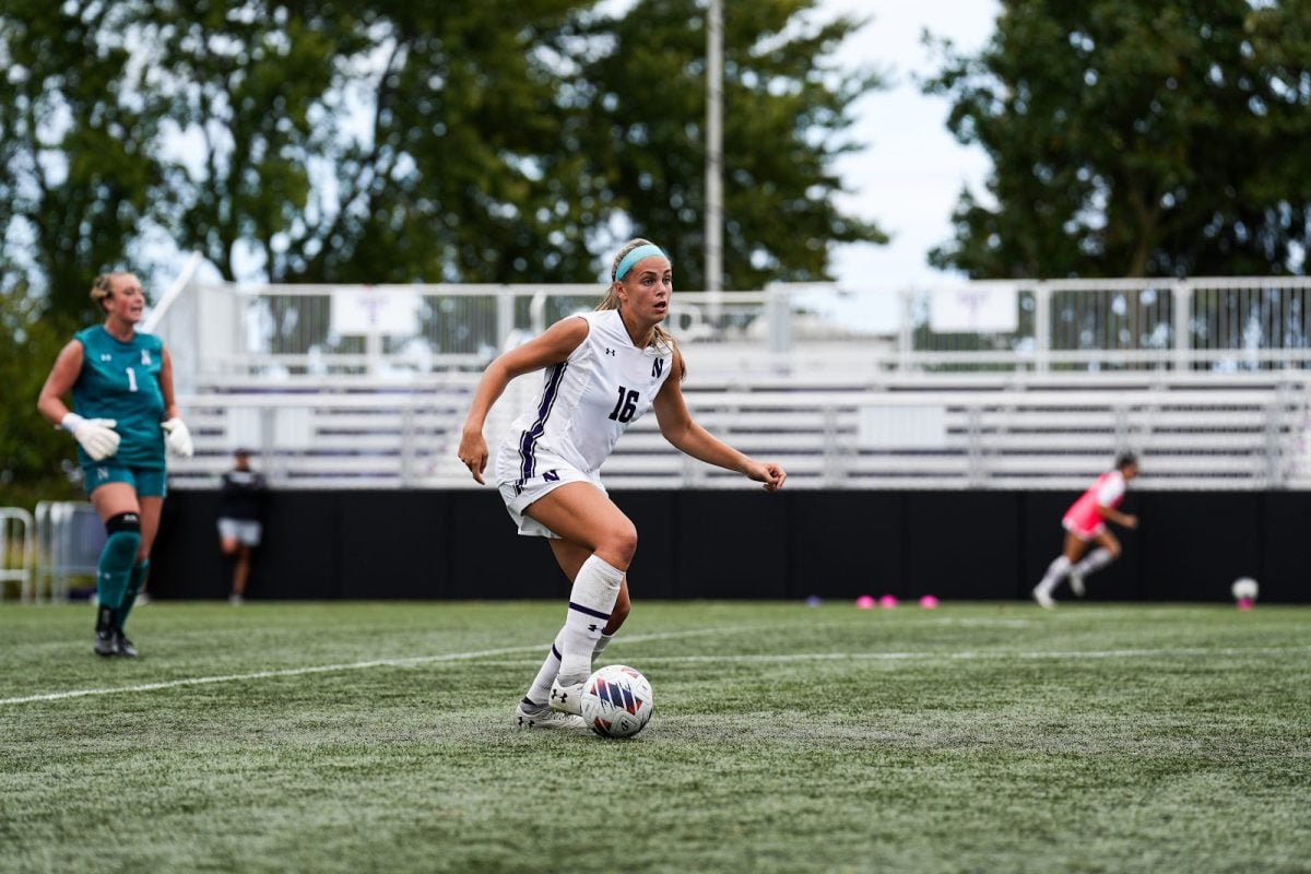 Northwestern defender Emma Phillips dribbles upfield during a match last season.