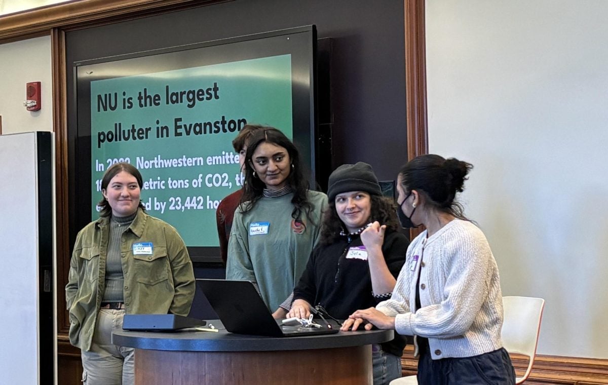 Students representing Fossil Free NU present at “Changing the Climate Culture at Northwestern” on Thursday.