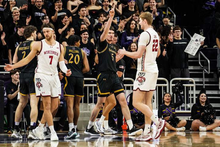 Graduate student center Keenan Fitzmorris celebrates after blocking a shot in Northwestern's Saturday loss to No. 17 Wisconsin. 