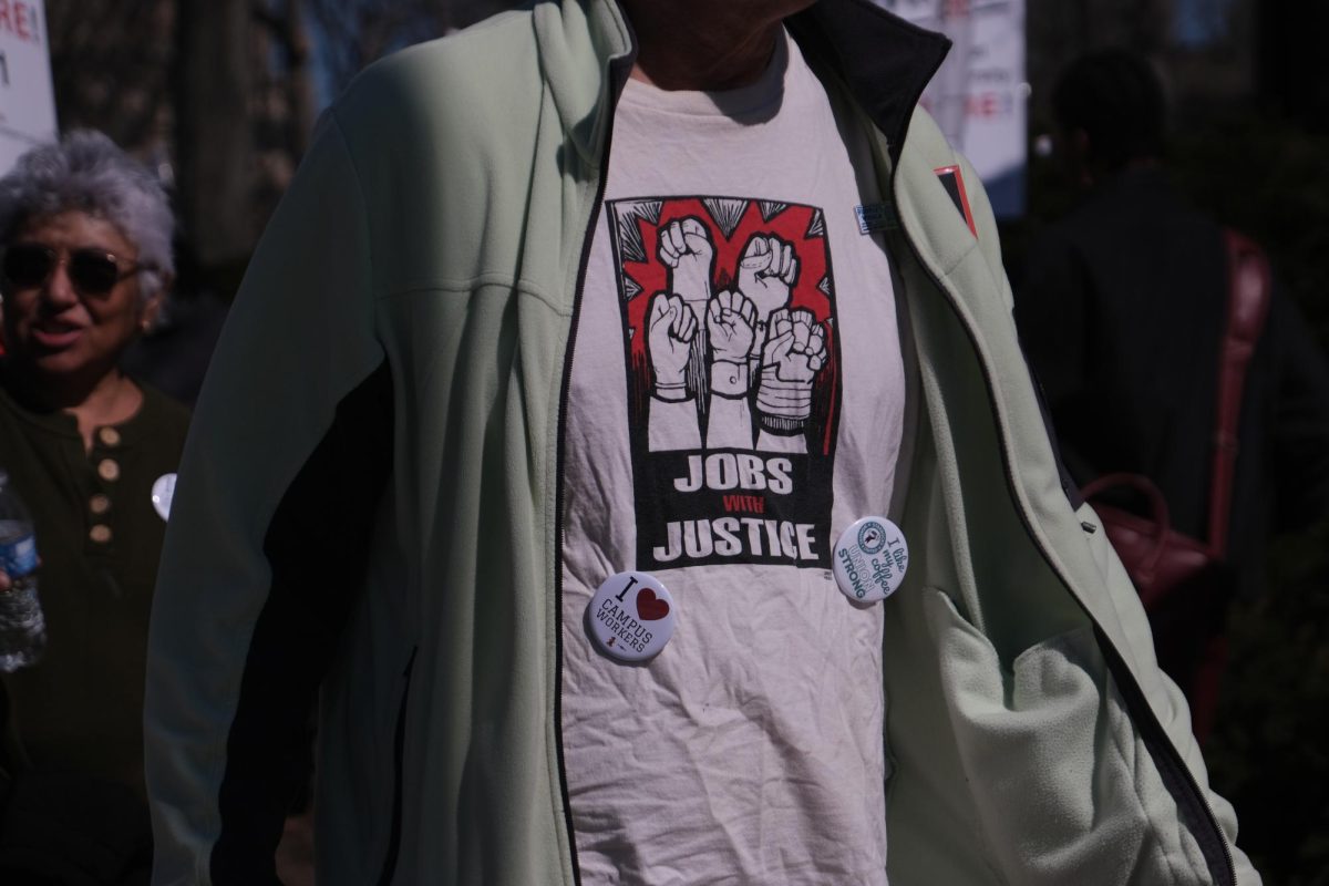 Picketers wore pins and t-shirts supporting their cause.