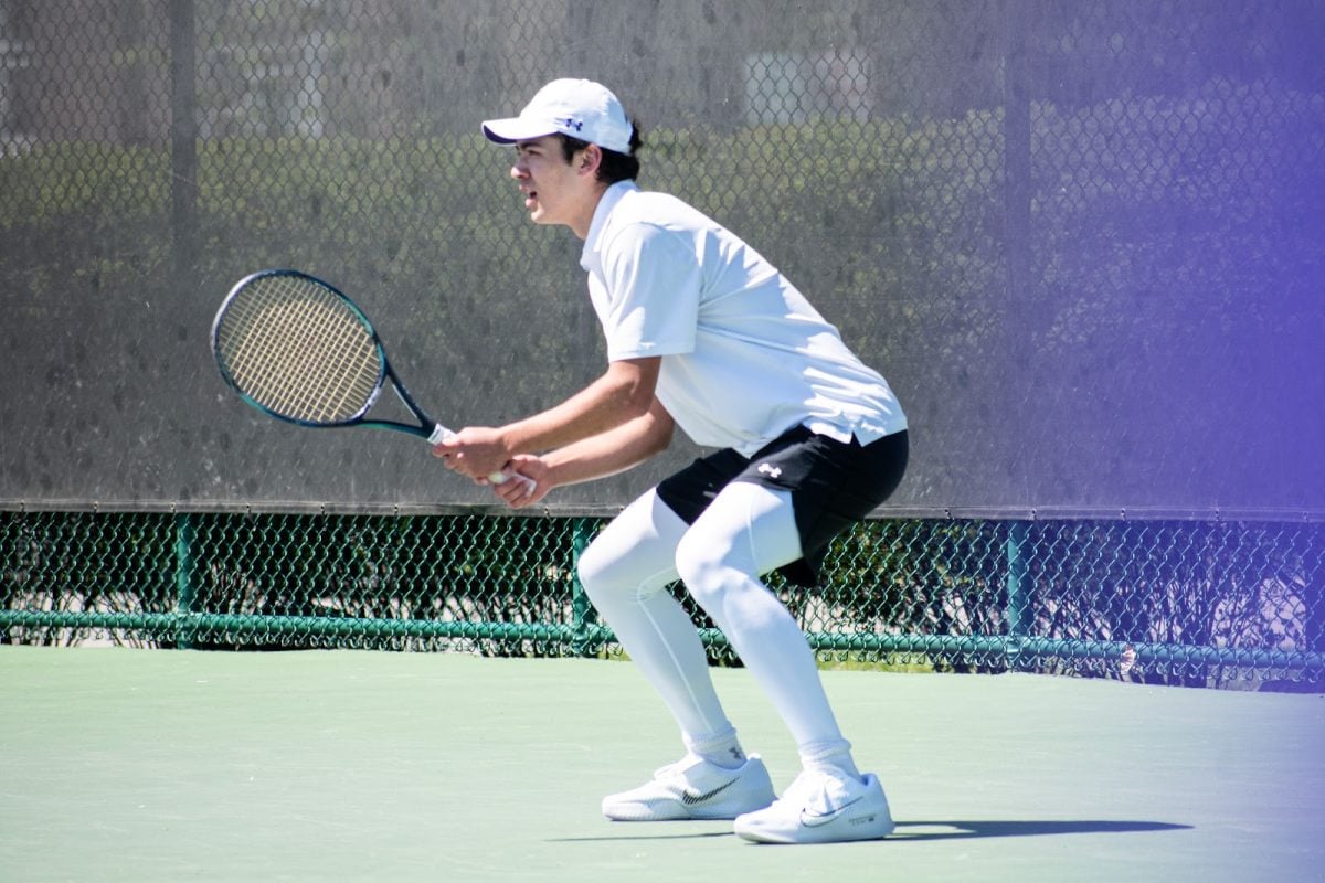 Sophomore Greyson Casey prepares to return a serve when Northwestern faced Wisconsin last season. Casey registered a 6-4, 7-5 win against the Badgers Friday.