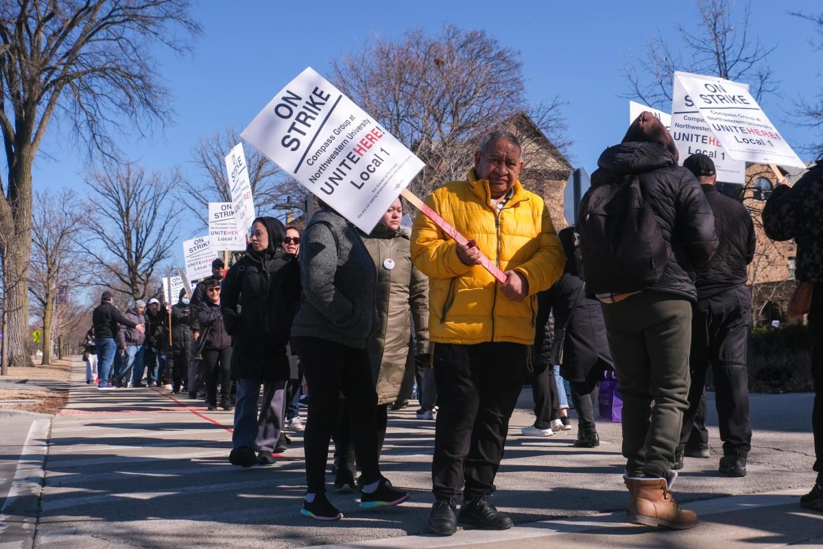 Dining hall workers gathered at several locations across campus, ranging from The Arch to Sargent Hall.