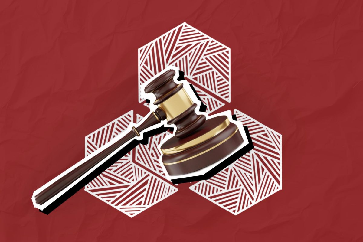 A brown gavel pictured over white geometric shapes and a red background.