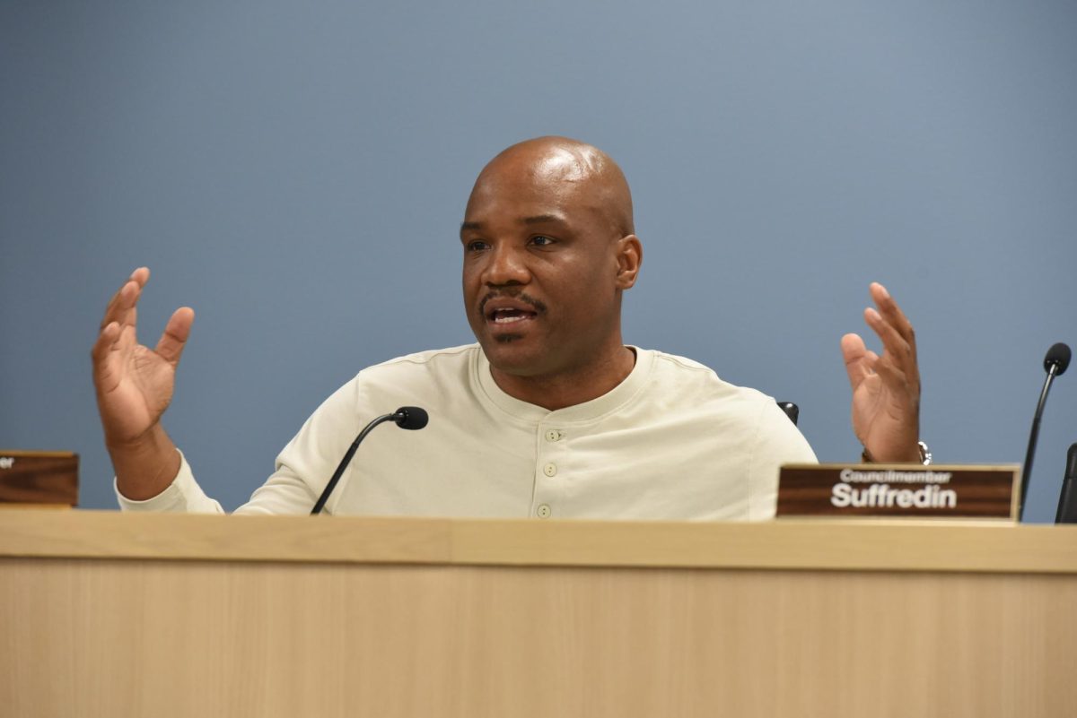 A person with their hands up.