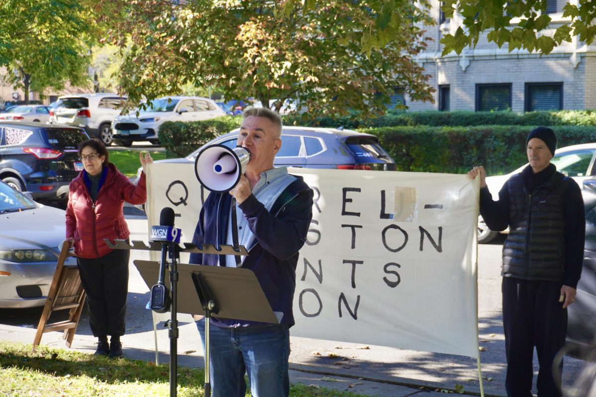 Union member Tim Barnett addresses rally attendees Sunday morning. 
