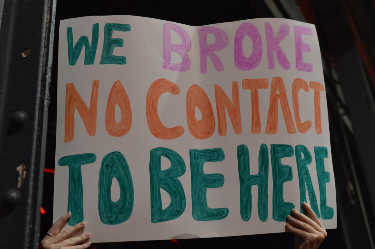 A sign in the crowd of the concert saying &ldquo;we broke no contact to be here.&rdquo; 