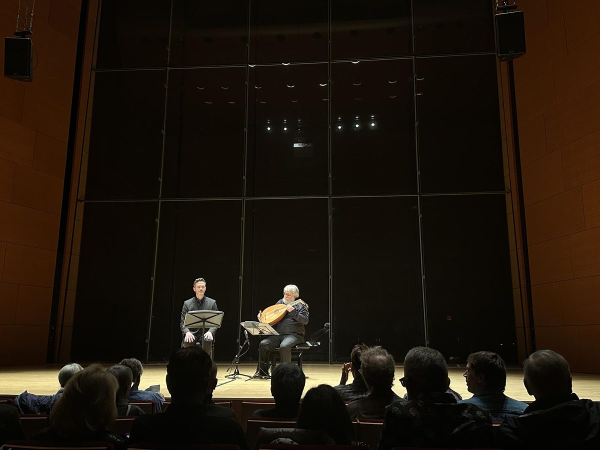 Paul O’Dette and Aaron Sheehan prepare for their performance.