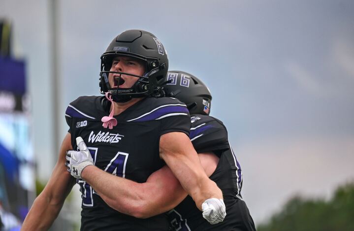 Graduate student tight end Hunter Welcing celebrates after scoring Northwestern's first touchdown in a Saturday win over Purdue.