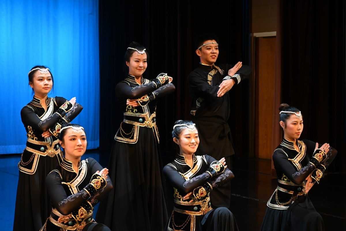 Nicole Bonilla (bottom left) and Typhoon performed Dao La 倒喇 as guests in the Reflections Repertory Company’s “Sparks Fly” show[cq-rn]. According to instructors Ouxun Jiang, a fifth-year cognitive psychology Ph.D. student, and Guoran Ye, a fourth-year math Ph.D. student. — bottom middle and top right, respectively — Dao La means singing and dancing in Mongolian, and this piece is an excerpt from a dance depicting a historic wedding between a Xiongnu prince and a Han princess.