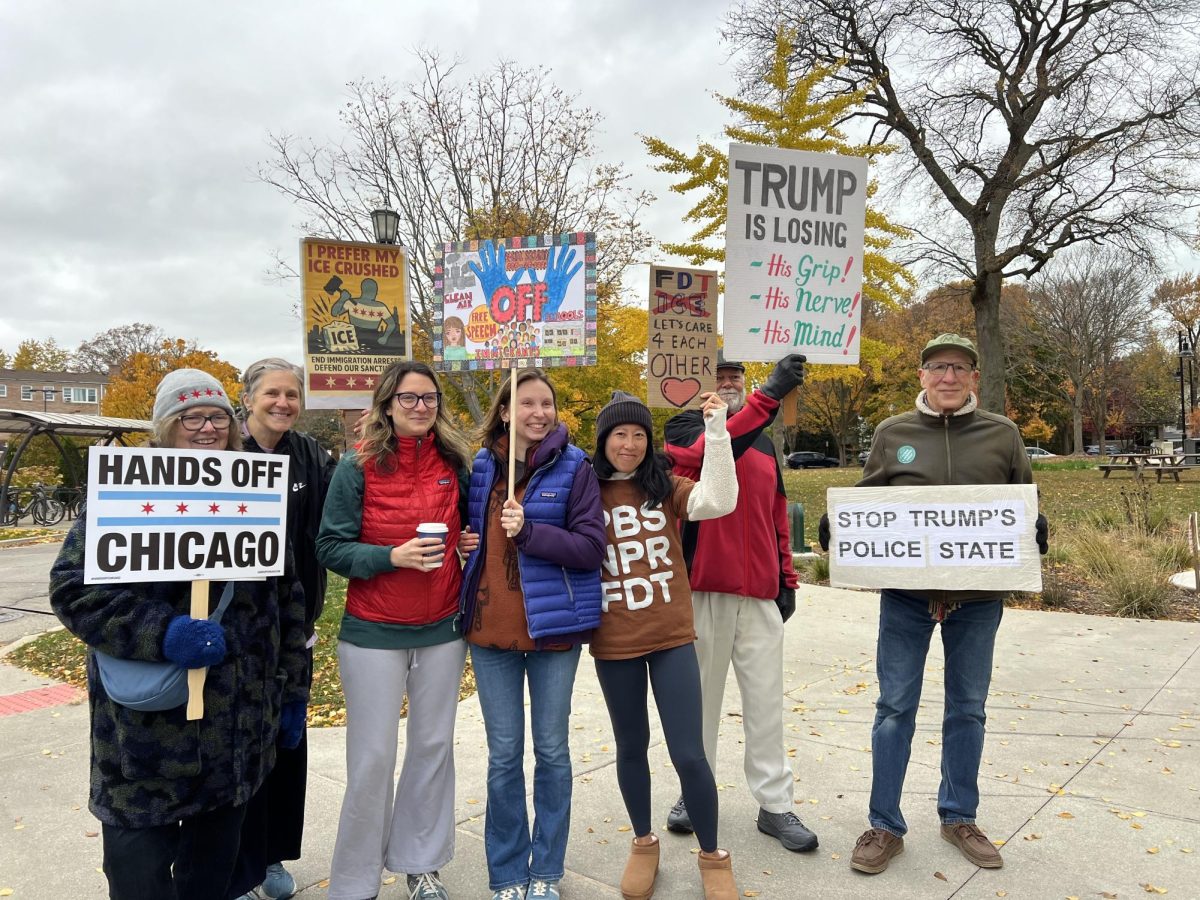 A small but consistent group, made primarily of Evanston residents, gathers every Saturday morning at Independence Park. They hold signs and encourage people to honk, wave or give a thumbs-up to raise awareness about their frustrations with the Trump administration’s decisions, including its use of power and cancellation of SNAP benefits.
