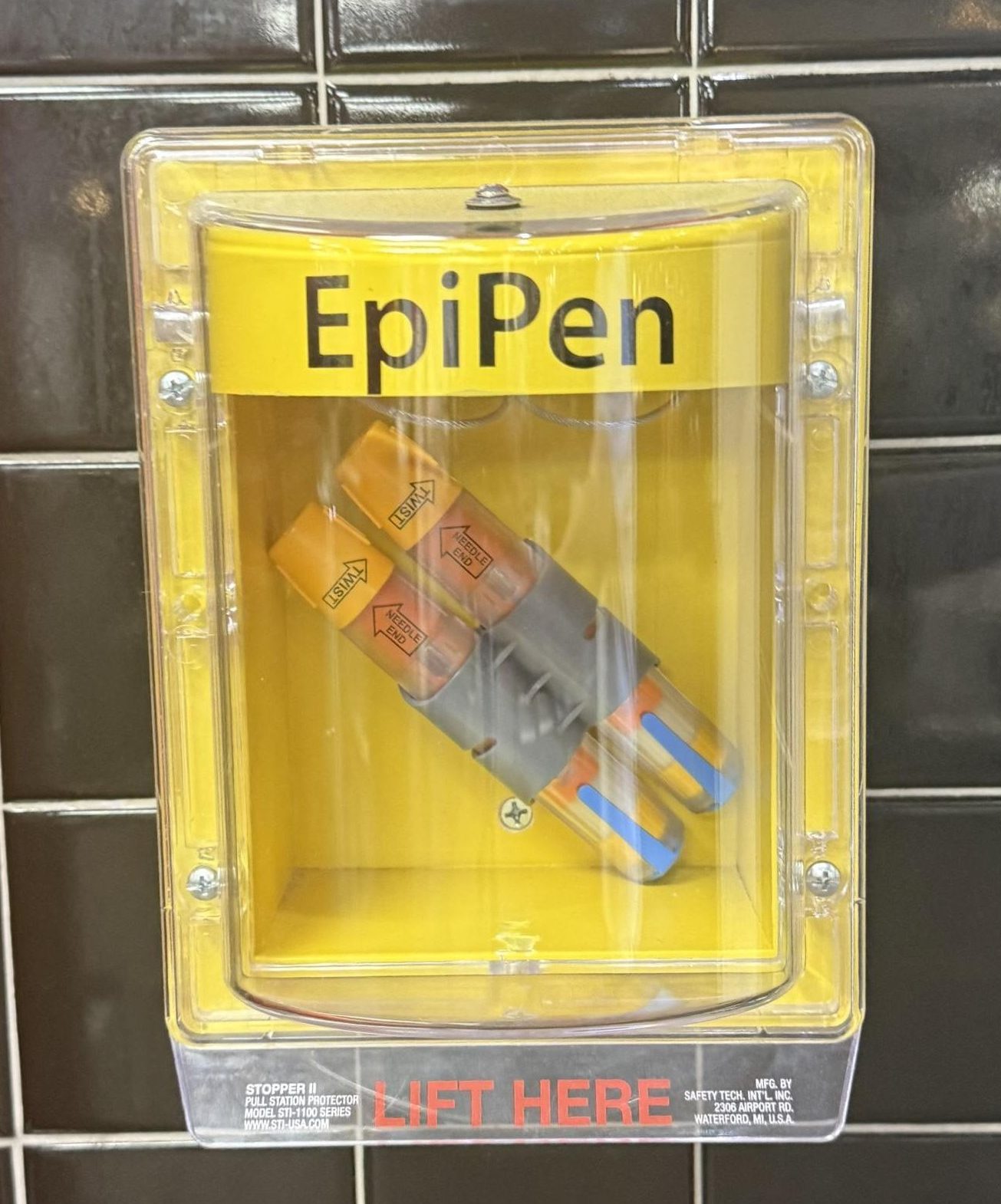 Two orange tubes in a yellow box with “EpiPen” written on top