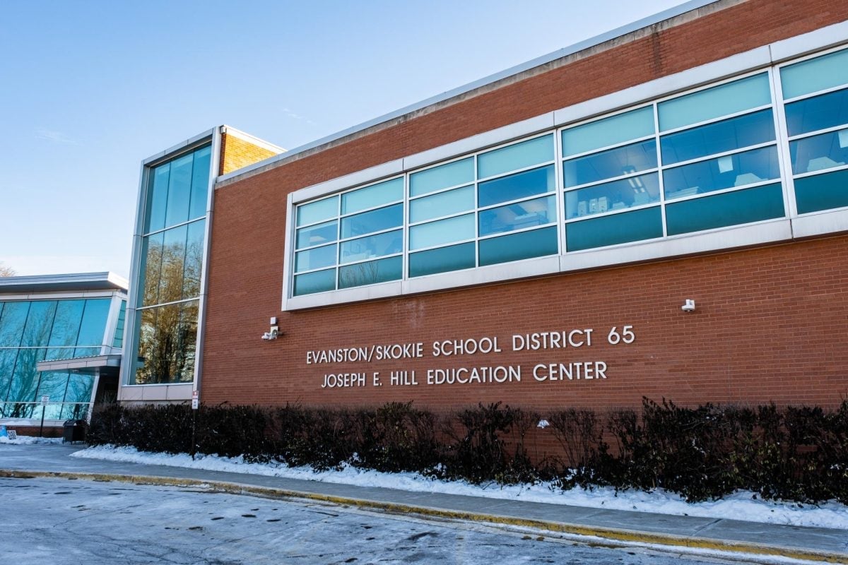 A building that says “Evanston/Skokie School District 65” and “Joseph E. Hill Childhood Center.”