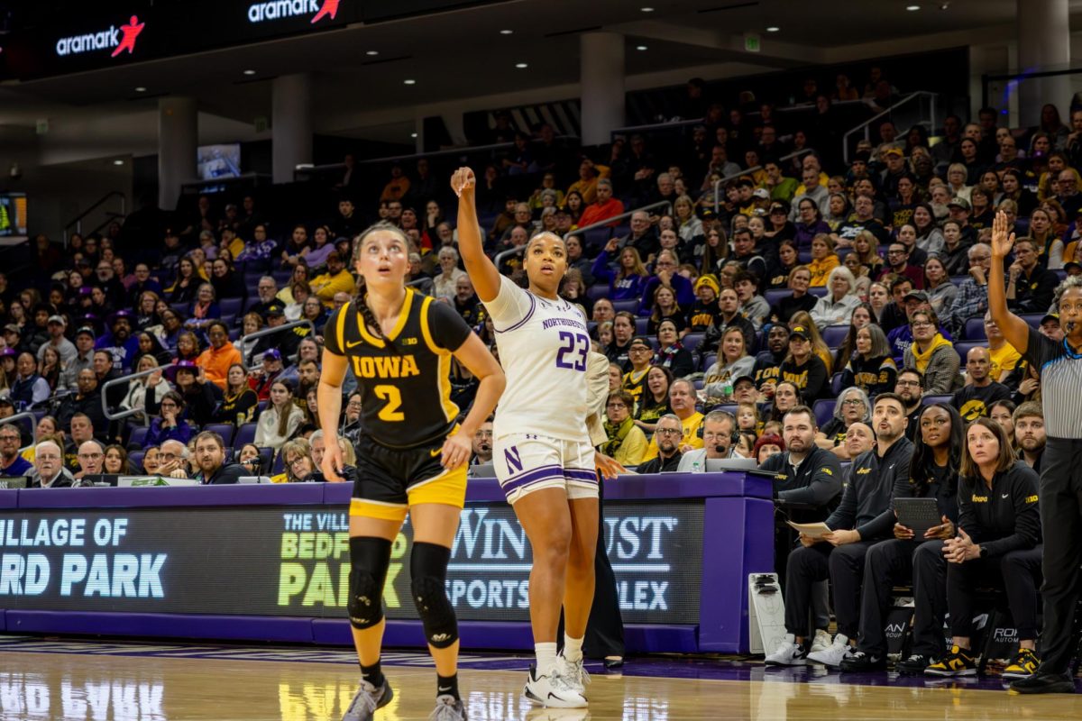Sophomore forward Tayla Thomas watches her shot travel to the rim.