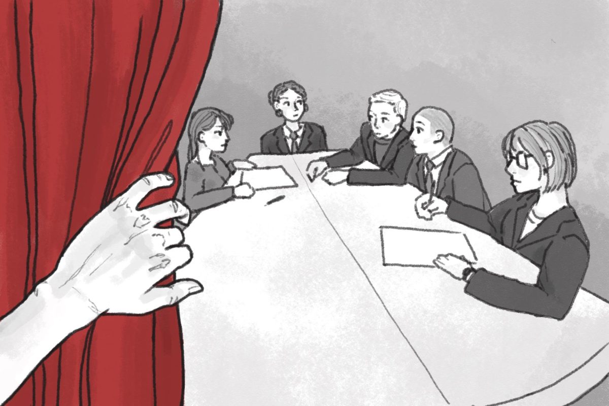 A person peering behind a red curtain to a table of five individuals in suits in deep discussion.