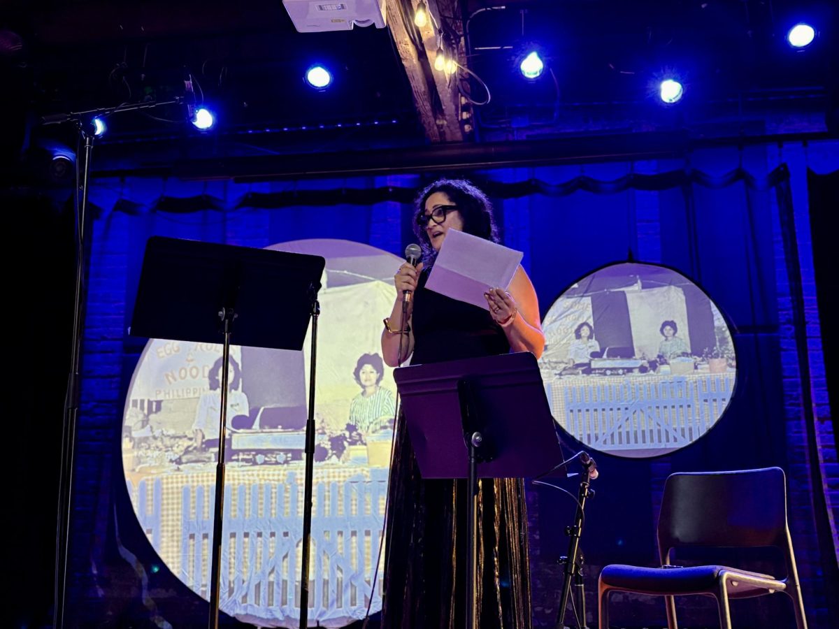 A person is reciting a speech on a stage.