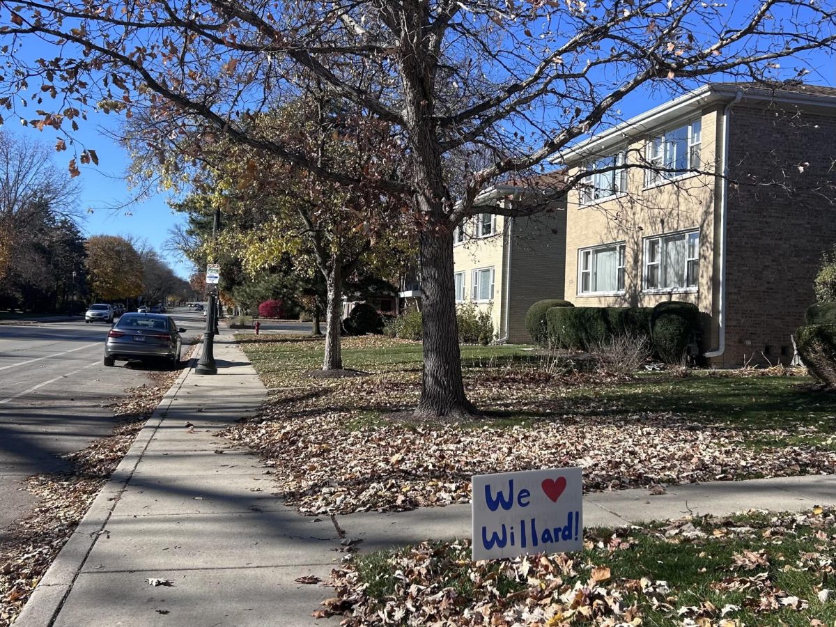 A street with a "We Heart Willard" sign.