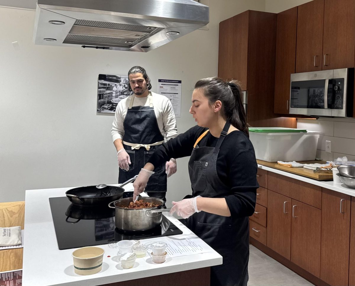 CSAW Assistant Director of Wellness and Campus Dietitian prepare heart-healthy meal