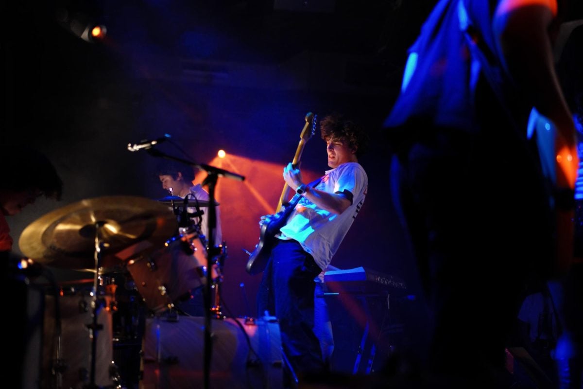 Person playing a guitar