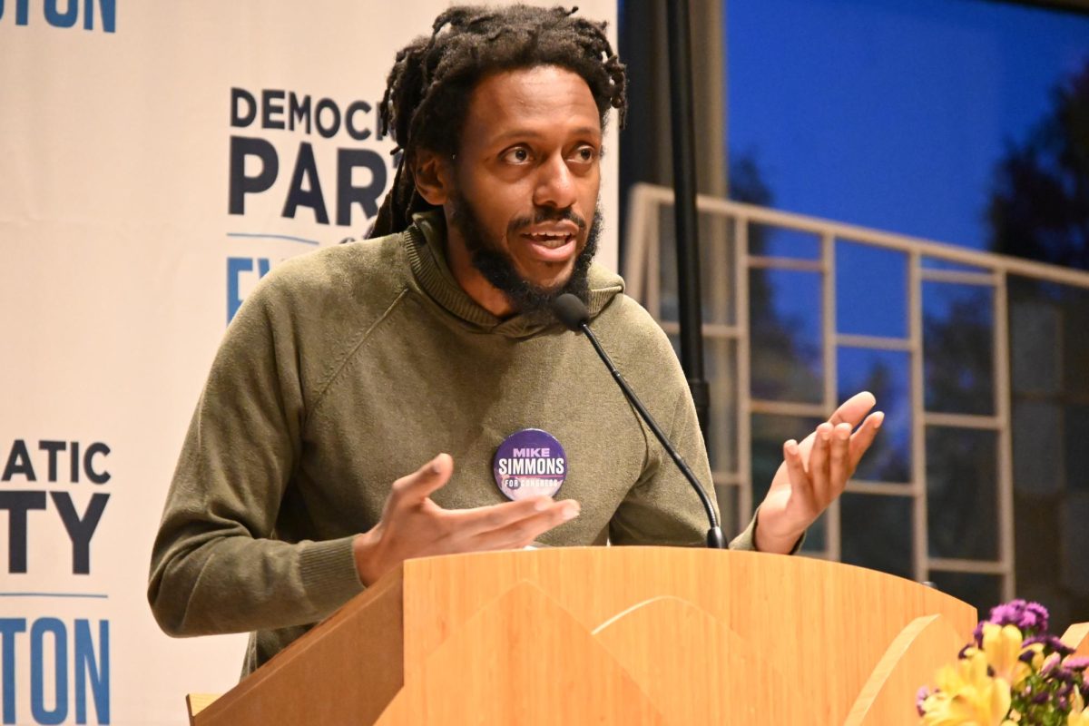 A man speaks into the microphone.
