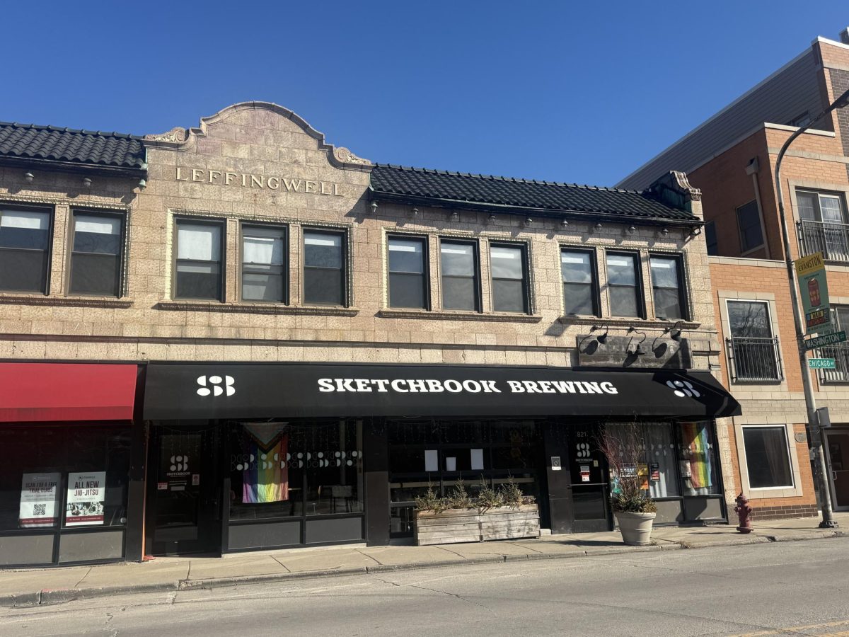 A black awning says the words “Sketchbook Brewing” in white.