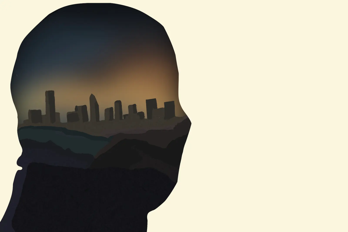 The outline of a head showcases a city’s skyline on a yellow background.