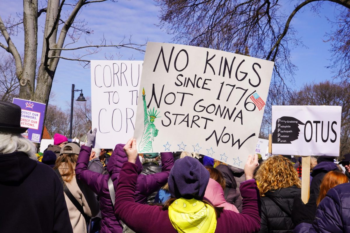 Colorful signs in hand, thousands gathered in Dawes Park for a “No Kings” rally Saturday morning.