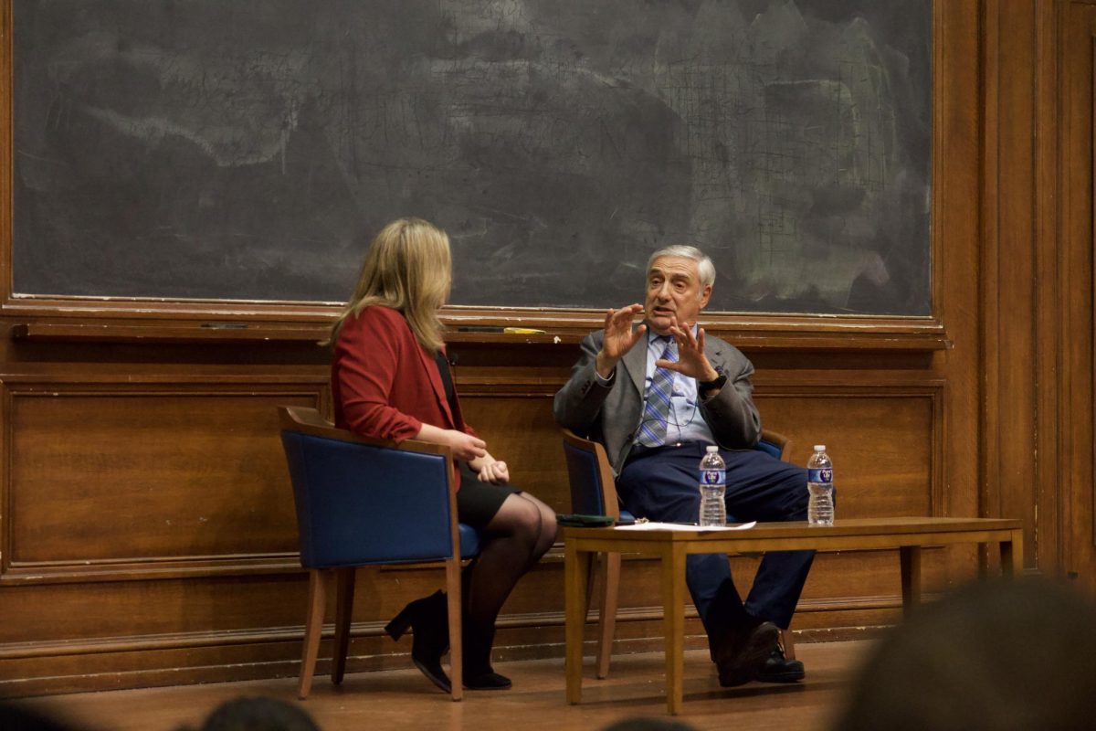 Two people sitting in chairs.