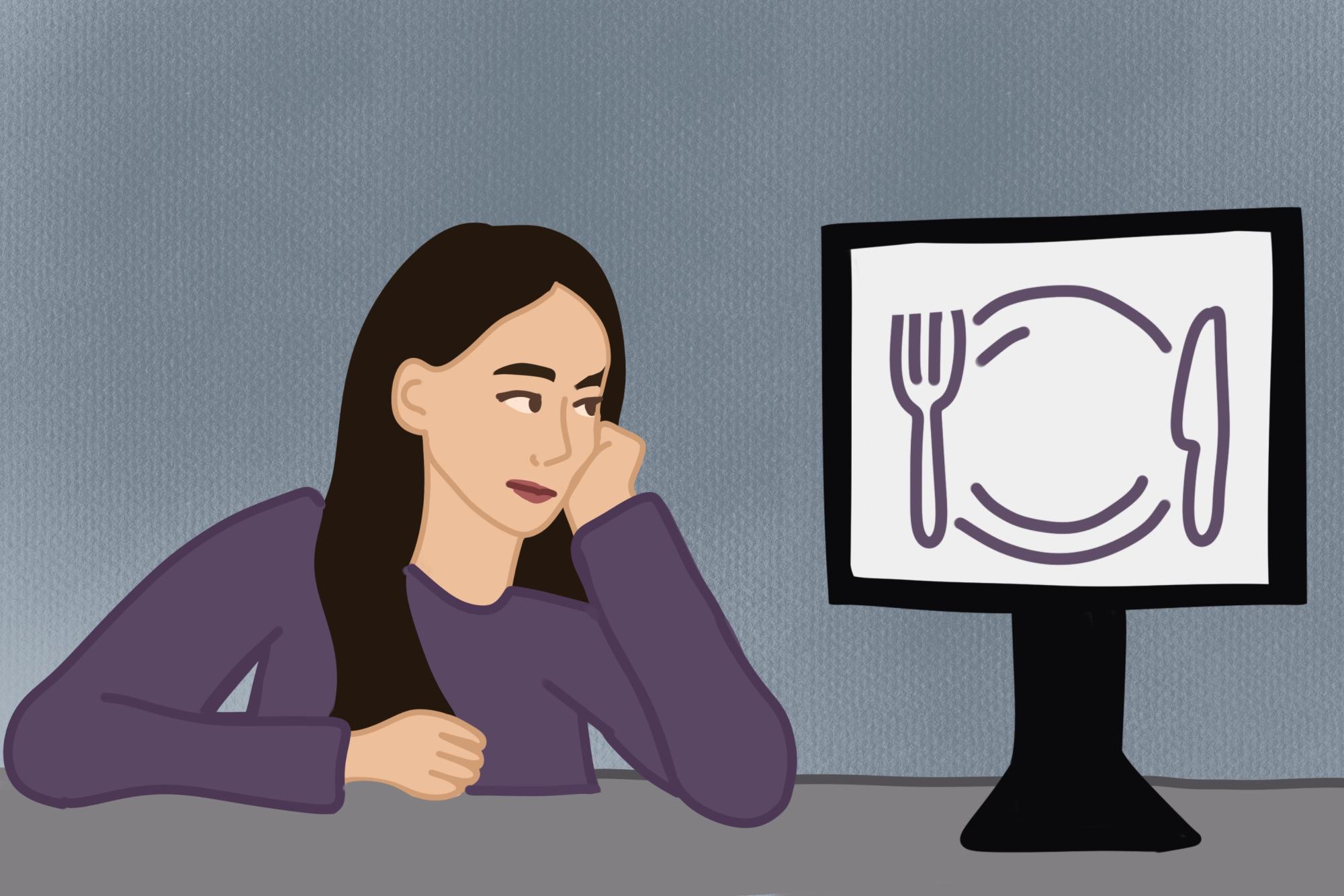 A person in a purple shirt looks at an image of a plate with a fork and knife.