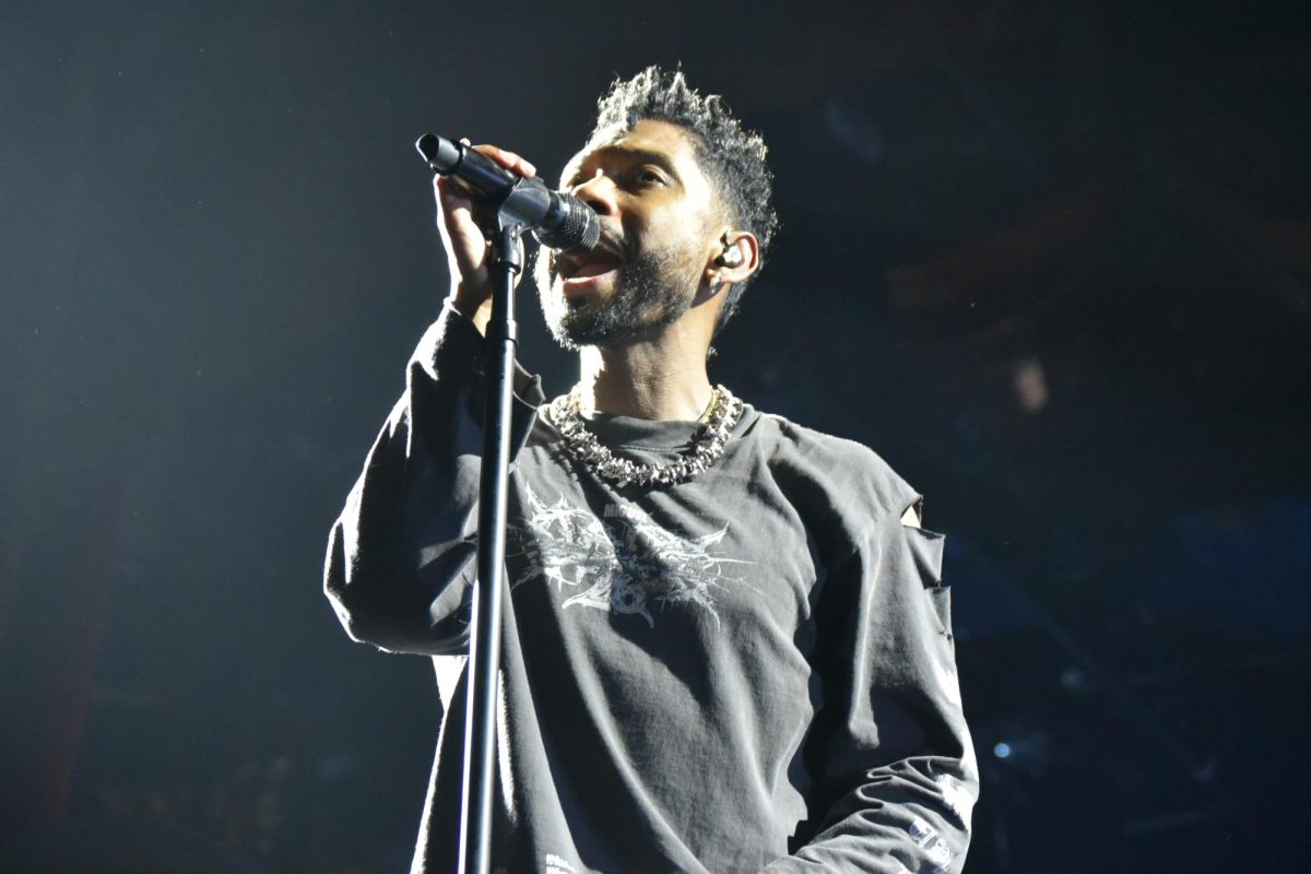 A man singing into a microphone.