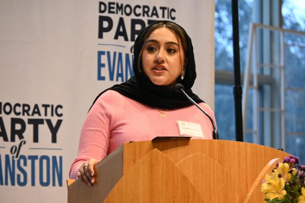 A person speaks into a microphone