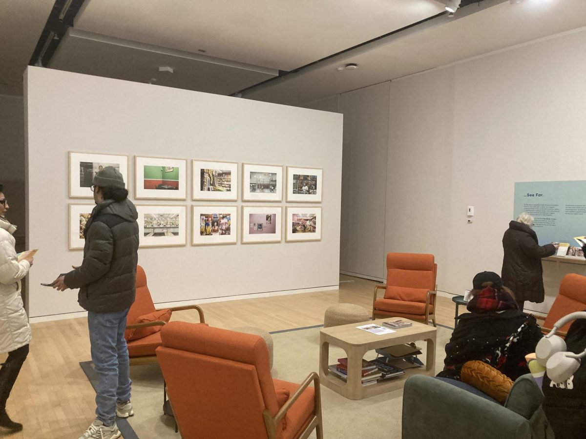 In the living room of the Block Museum, 10 photographs from Jonathan Castillo’s project “Immigrant Owned” can be viewed. There is a seating space and table for viewers to write their thoughts on the artwork.
