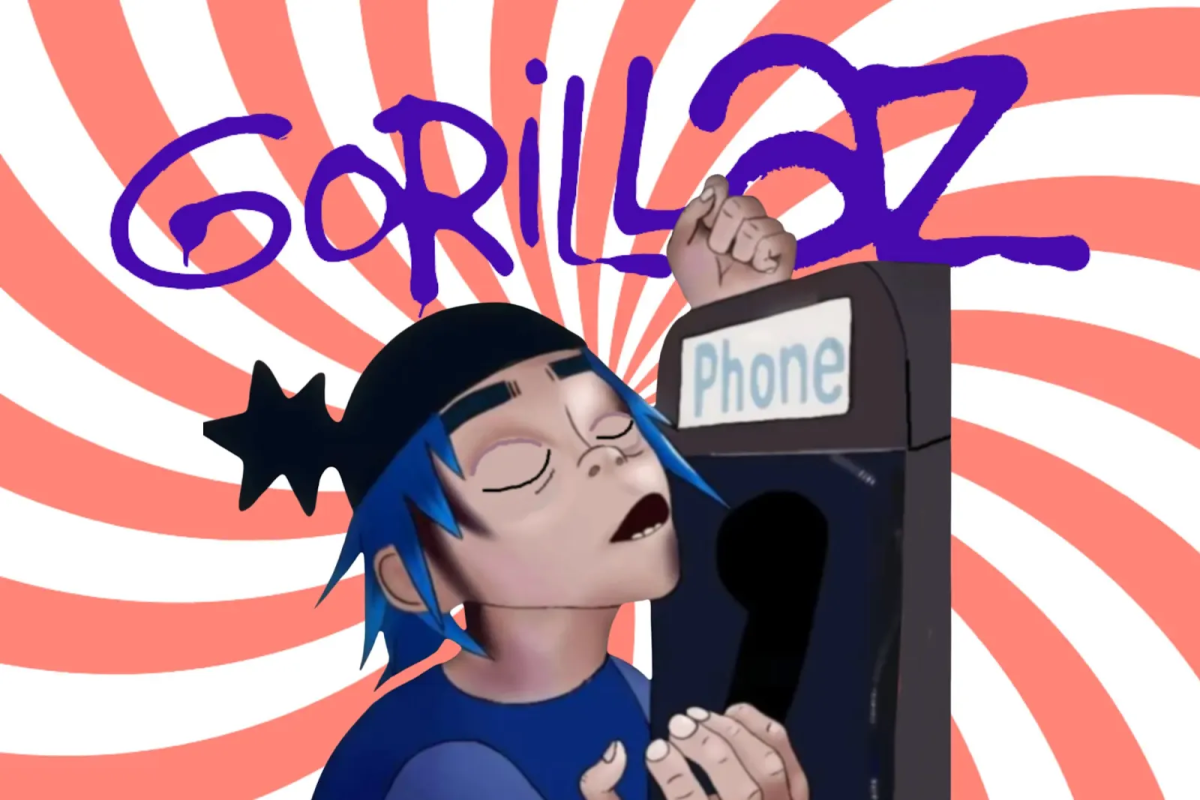 Gorillaz vocalist 2-D in front of a spiral backdrop, holding a phone from a phone booth.