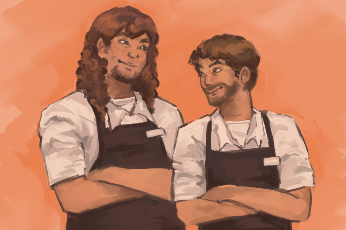 Theo Von and David Spade standing next to each other with restaurant aprons on.