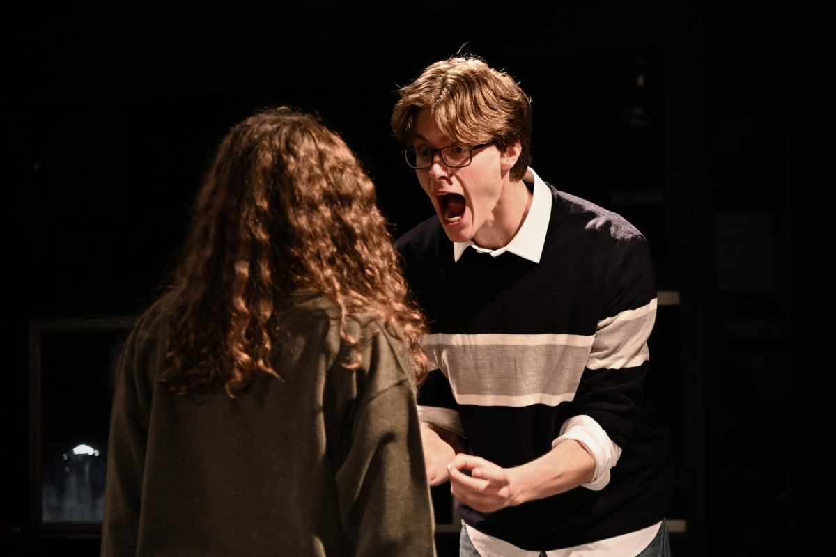 A man screams at a woman.